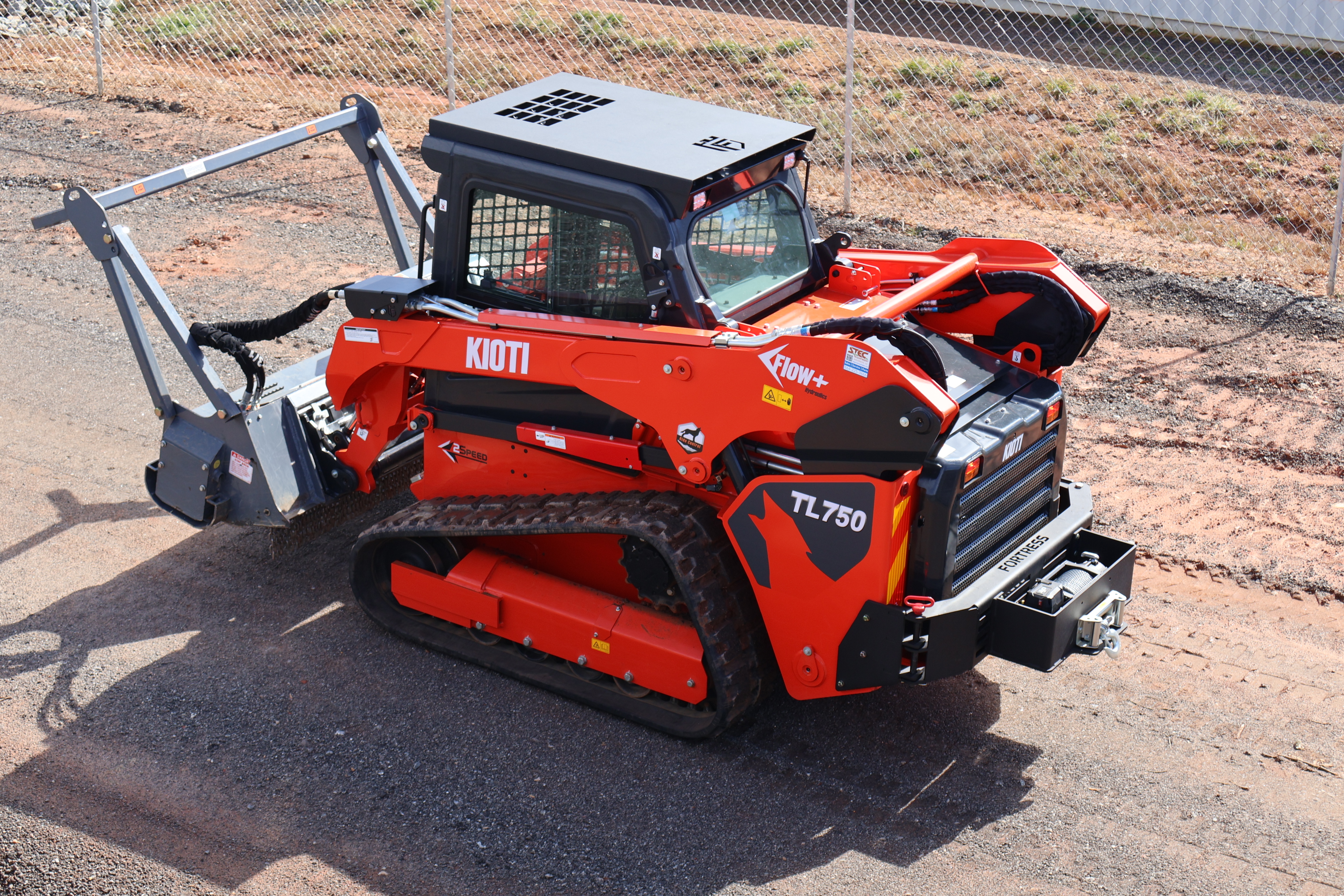 Kioti Skid Steer / Compact Track Loader with full equipment guarding by Fortress Equipment. Includes: coupler guard, roof guard, rear bumper guard, and winch box.